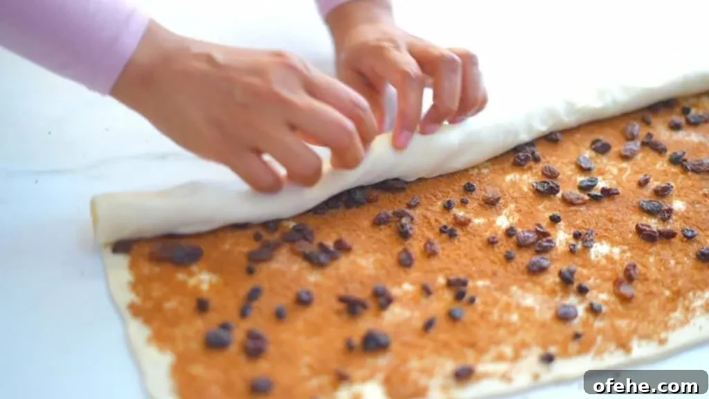 Cinnamon Danish (Kanelsnegl) Recipe: Classic Danish Pastry 10 shaping pastry swirls