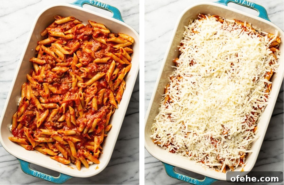 topping a baking dish with mostaccioli with mozzarella cheese