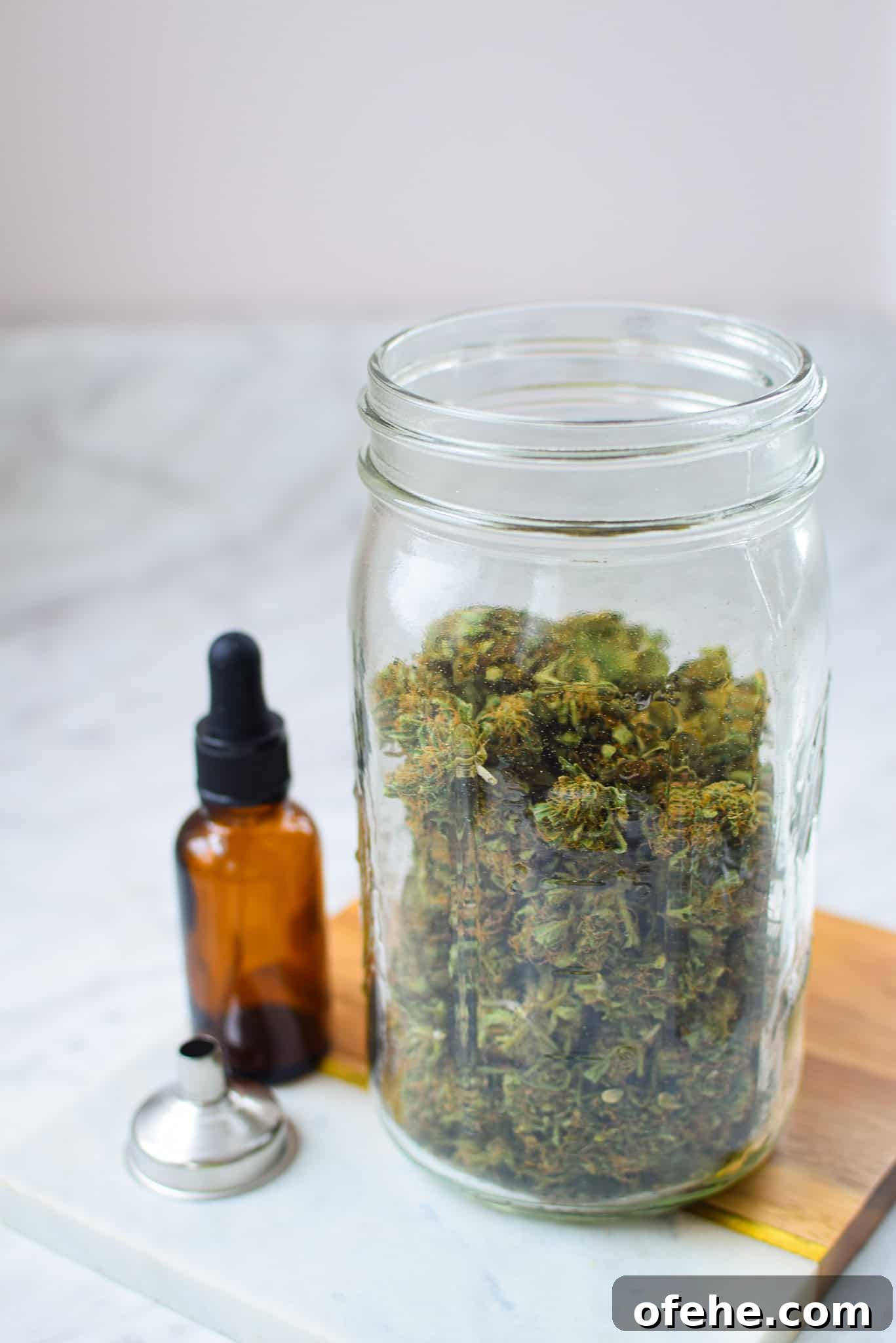 How to Dry Cannabis to Preserve Flavor and Potency 9 A picture of cannabis stored in a mason jar.