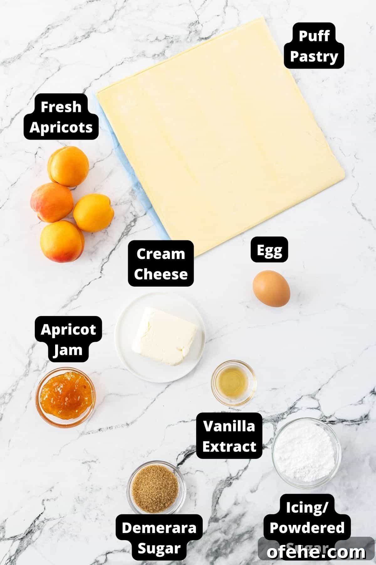 Apricot Cream Cheese Puff Pastry Tart Recipe 3 Ingredients in this recipe on a white marble background.