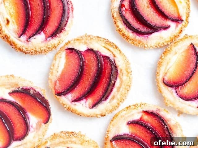 up close shot of tarts on baking paper.
