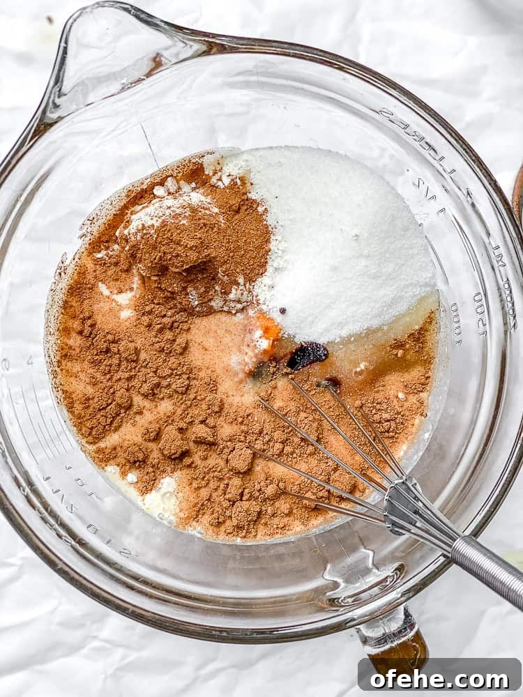 Mini Pumpkin Pie Recipe: Perfect Individual Fall Desserts 4 process shot of mixing ingredients together in a bowl