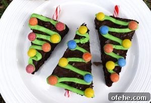 Christmas Tree Brownies Recipe: Festive St. Patrick’s Day Treat 7 Christmas Tree Brownies are rich and fudgy chocolate brownies decorated like Christmas trees for a fun Christmas treat. #christmas #christmasbaking #christmastreebrownies #christmasbrownies #fudgybrownies