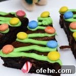 Christmas Tree Brownies Recipe: Festive St. Patrick’s Day Treat 8 Christmas Tree Brownies are rich and fudgy chocolate brownies decorated like Christmas trees for a fun Christmas treat. #christmas #christmasbaking #christmastreebrownies #christmasbrownies #fudgybrownies