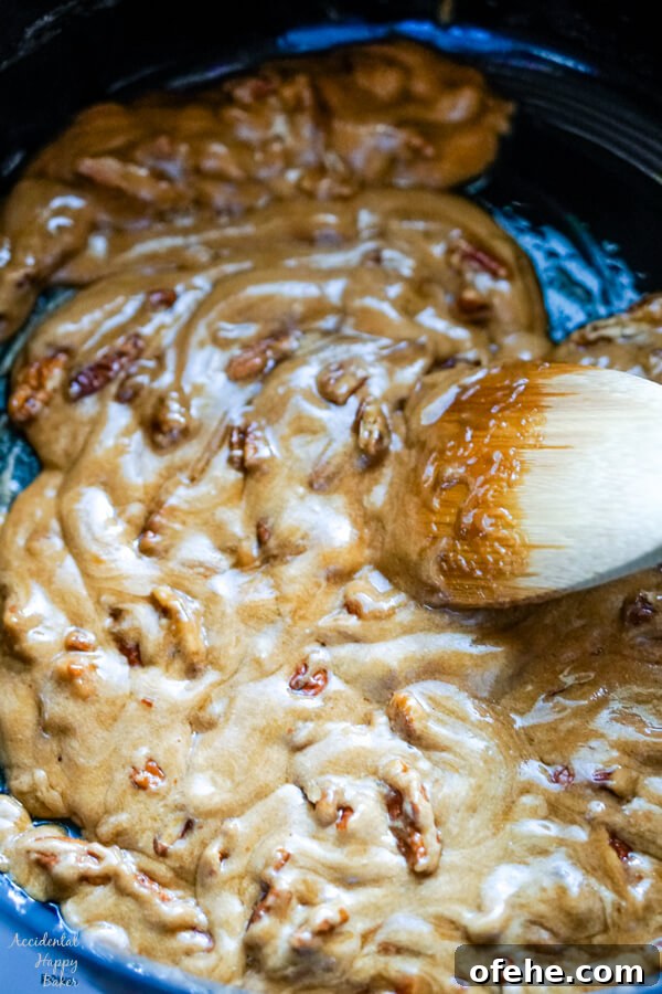 Salted Caramel Pecan Popcorn Recipe — Sweet & Crunchy Snack 6 A close up image that shows the texture of the caramel after the baking soda and salt are added.