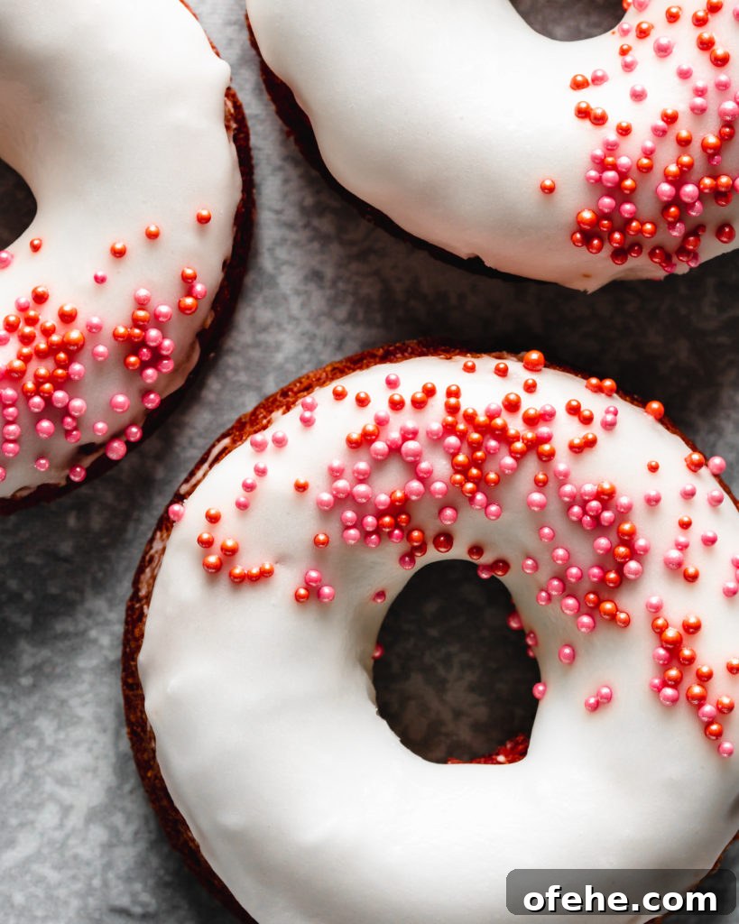 Baked Red Velvet Donuts Recipe for Moist, Fluffy Donuts 4 Easy to make baked red velvet donuts are glazed with a cream cheese frosting