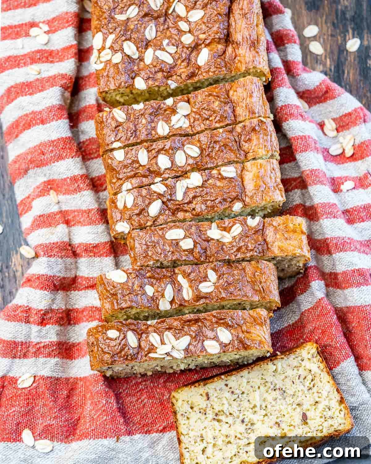 Cottage Cheese Loaf Recipe: Soft, Tangy Homemade Bread 7 bread slices next to each other and one slice facing up.