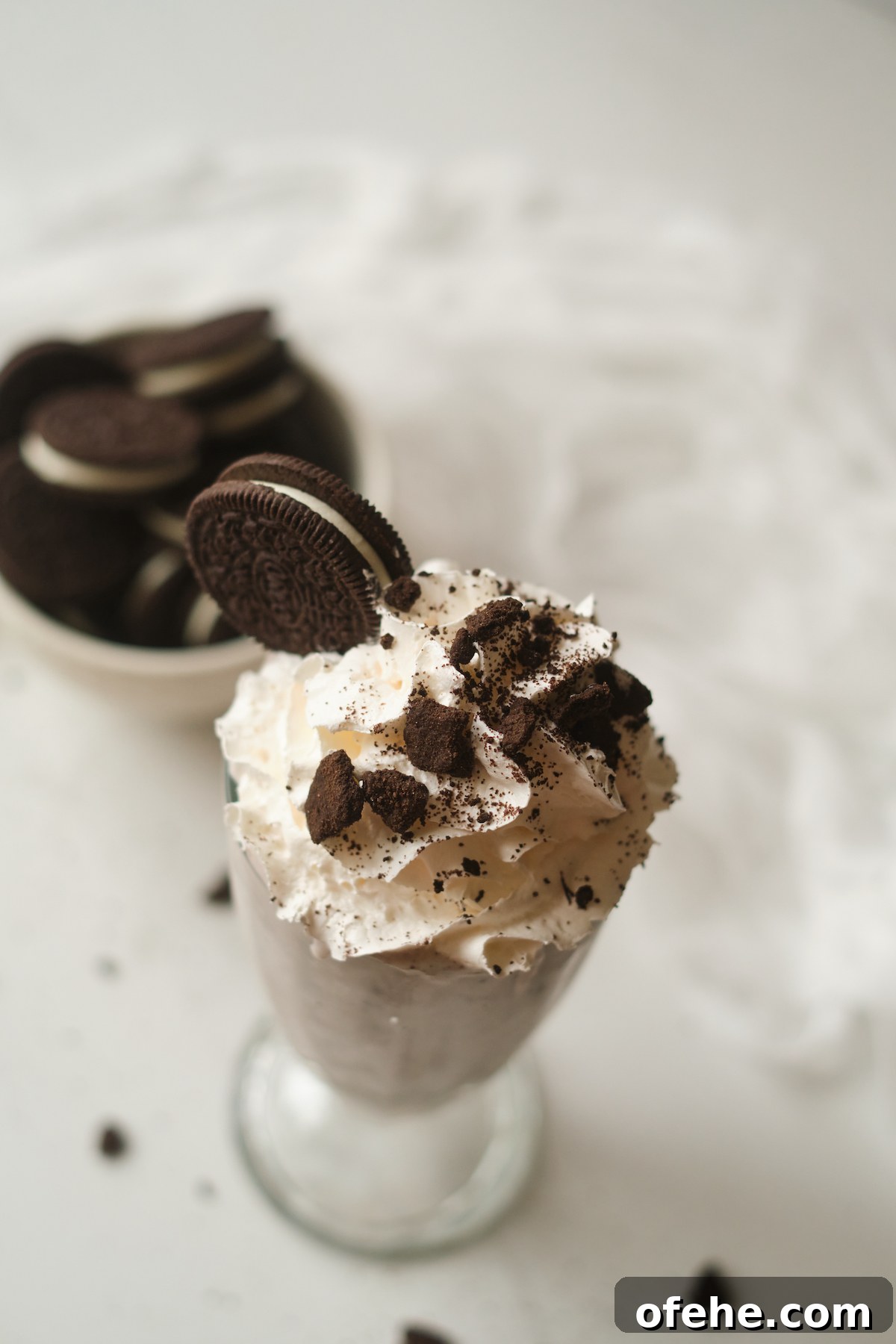 Oreo Milkshake Recipe: How to Make It with a Ninja Creami 6 top down view of a completed oreo milkshake