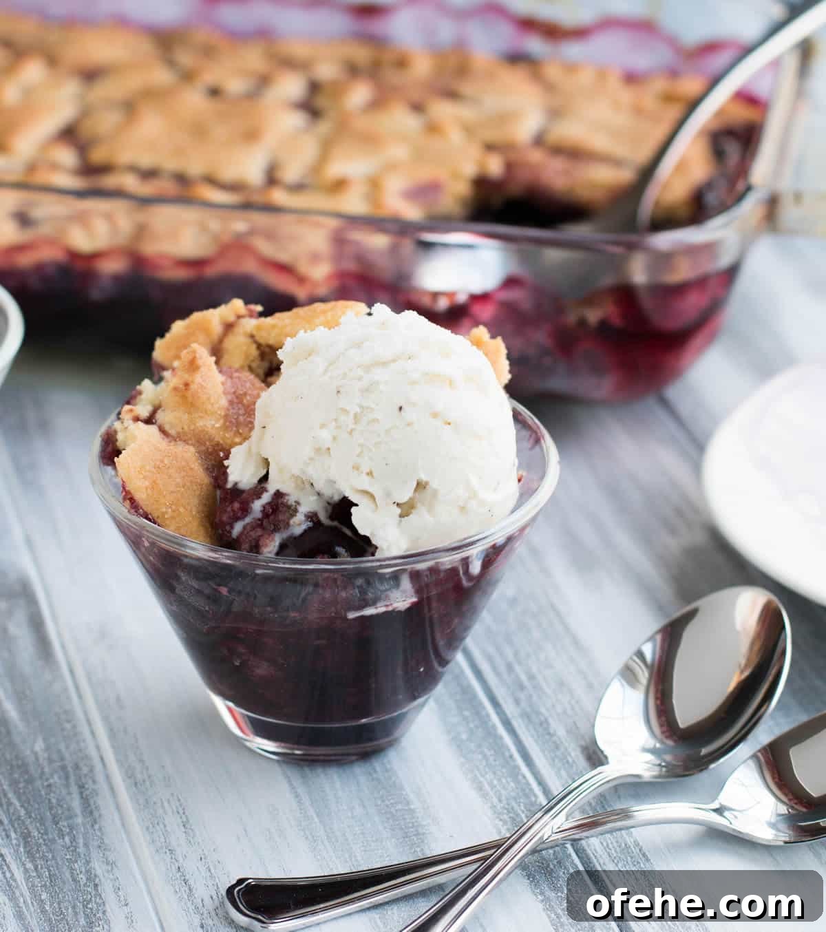 Cherry Sugar Cookie Cobbler Recipe: Sweet Cherry Dessert with Crumb Topping 2 Sugar Cookie Cherry Cobbler. Sweet, juicy cherries bake beneath a tender, yet crispy crust of buttery sugar cookies. A fun twist on traditional cobbler.