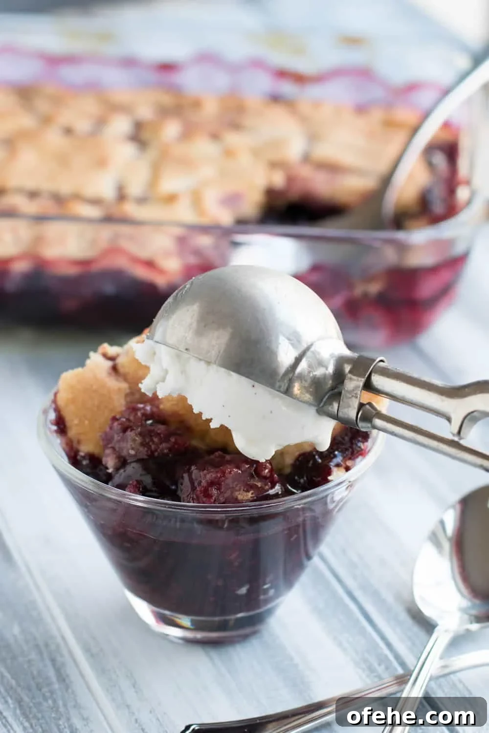Cherry Sugar Cookie Cobbler Recipe: Sweet Cherry Dessert with Crumb Topping 7 Sugar Cookie Cherry Cobbler. Sweet, juicy cherries bake beneath a tender, yet crispy crust of buttery sugar cookies. A fun twist on traditional cobbler.