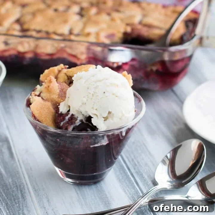 Sugar Cookie Cherry Cobbler. Sweet, juicy cherries bake beneath a tender, yet crispy crust of buttery sugar cookies. A fun twist on traditional cobbler.