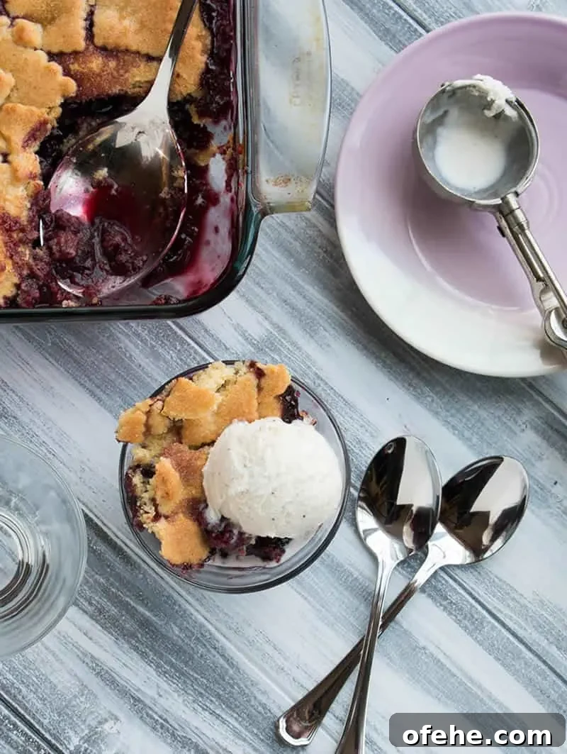 Cherry Sugar Cookie Cobbler Recipe: Sweet Cherry Dessert with Crumb Topping 3 Sugar Cookie Cherry Cobbler. Sweet, juicy cherries bake beneath a tender, yet crispy crust of buttery sugar cookies. A fun twist on traditional cobbler.