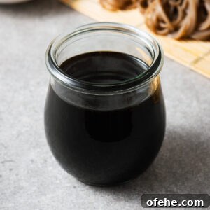 A glass jar with homemade mentsuyu, the concentrated Japanese soup base.