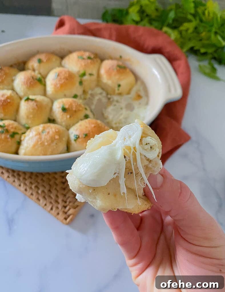 stuffed garlic bombs recipe with biscuit dough.