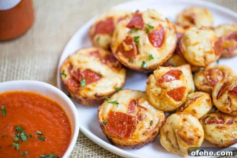 mini pizzas with pepperoni on top.
