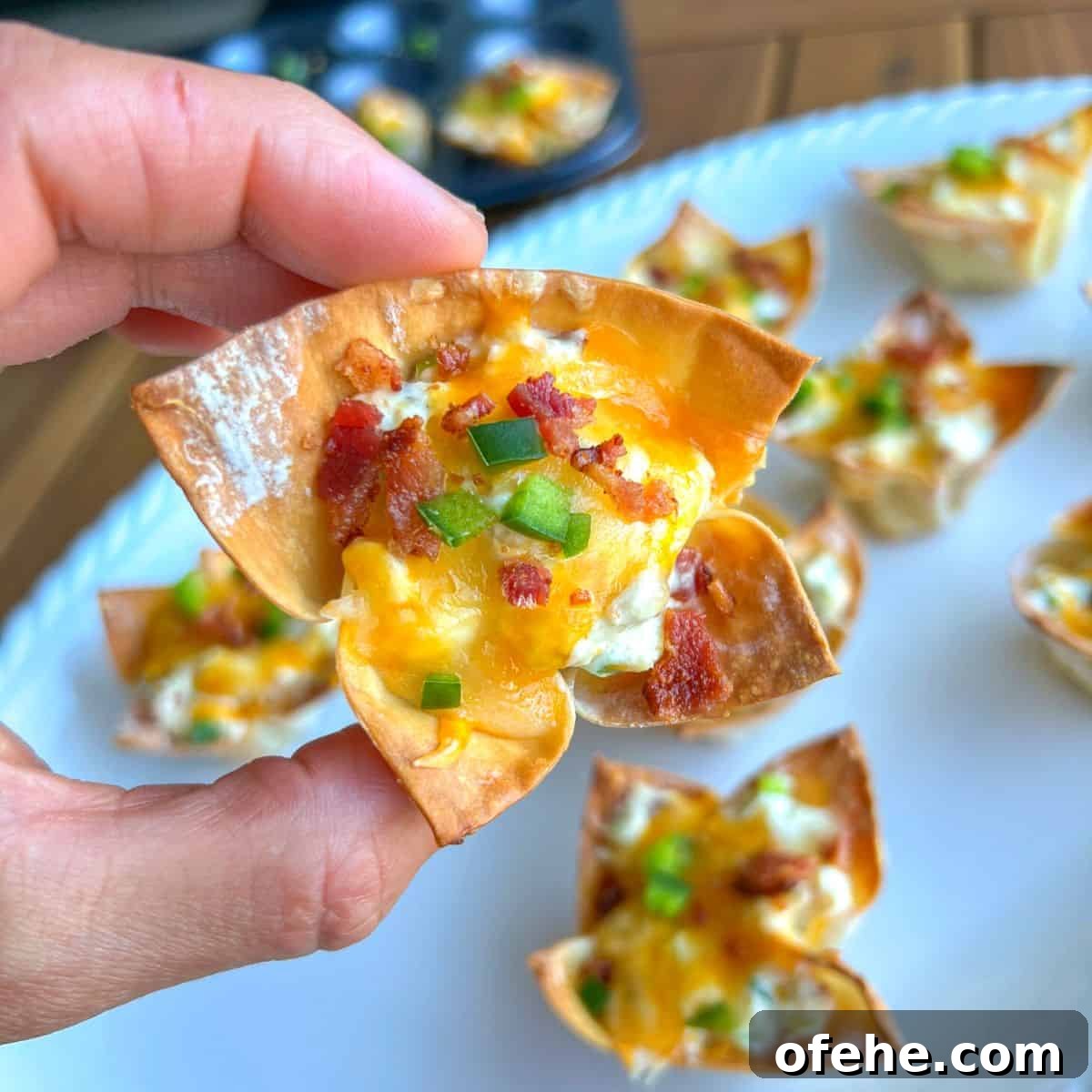 Jalapeno popper wonton cups appetizer.