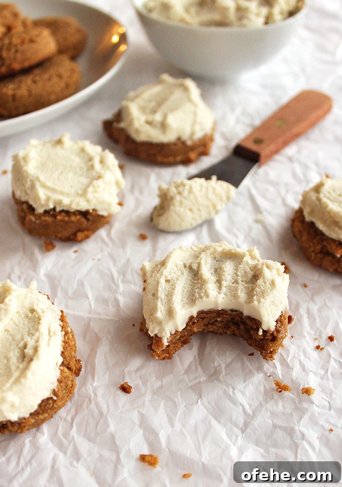 Soft Pumpkin Cookies with Cashew Frosting — Gluten-Free Recipe 5 Soft pumpkin cookies with cashew frosting - Pillow-y soft pumpkin cookies topped with cashew frosting that tastes like buttercream. The perfect dessert recipe for fall or the holidays, especially Thanksgiving! (Gluten free and Dairy Free) | robustrecipes.com