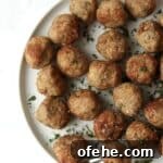 turkey meatballs on a plate with a fork