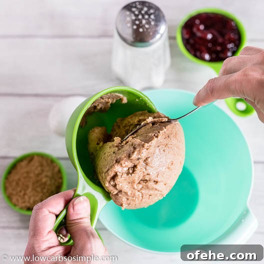 Sugar-Free Nut-Butter and Jam Thumbprint Cookies (Flourless) 5 Adding Almond Butter | Low-Carb, So Simple