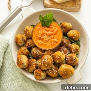 Italian Eggplant Meatballs in Tomato Sauce 17 Polpette di Melanzane or eggplant meatballs in a bowl with sauce.