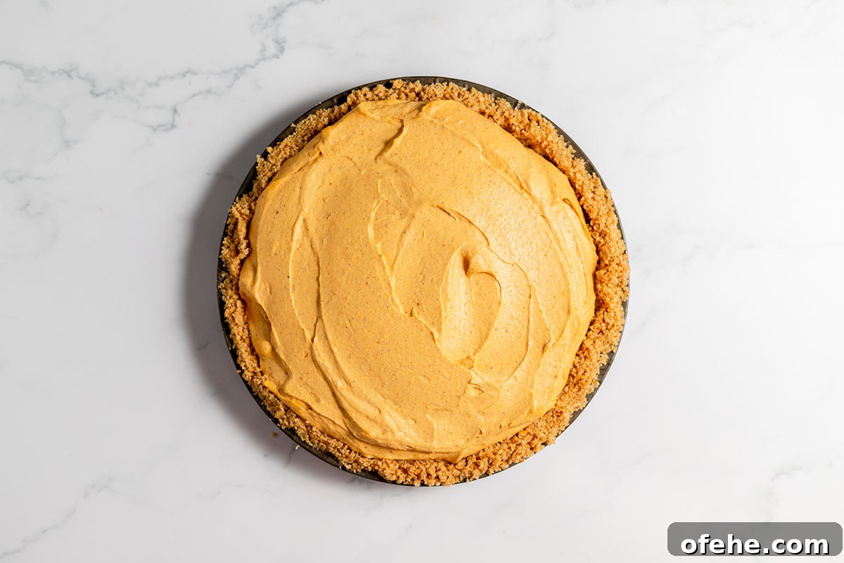 Pumpkin cheesecake in homemade graham cracker crust.