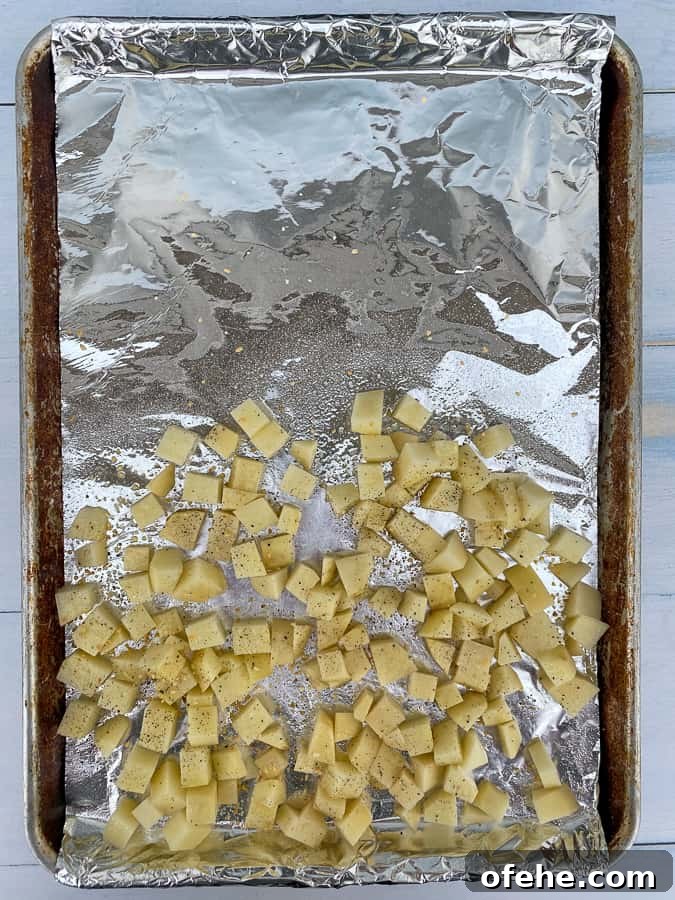 Potato cubes on a sheet pan