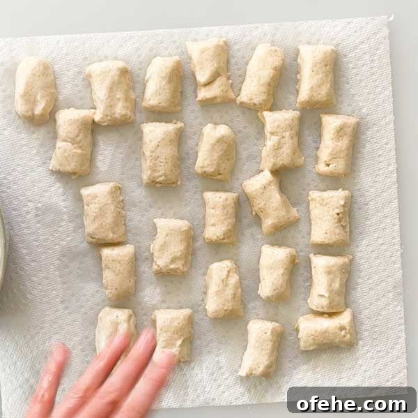 Placing the dip pretzel bites on a paper towel