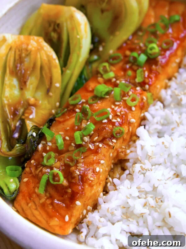 Honey sriracha salmon with a side of bok choy and rice