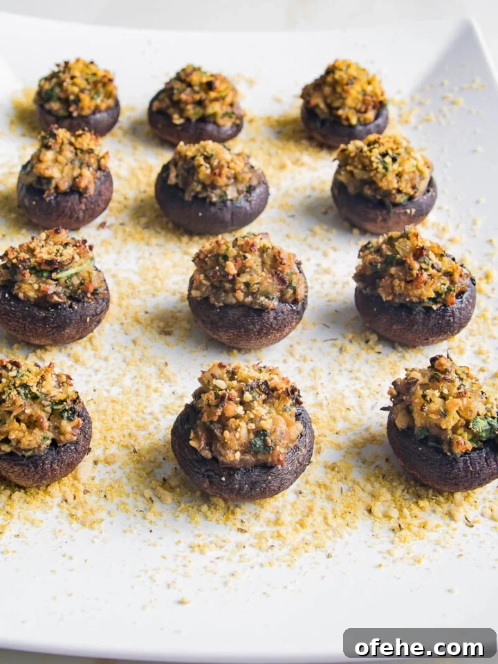 White rectangular serving plate with stuffed mushrooms