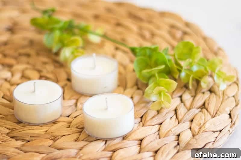 DIY Citronella Candles to Keep Mosquitoes Away 5 tea light candles for bugs on wicker placemat.