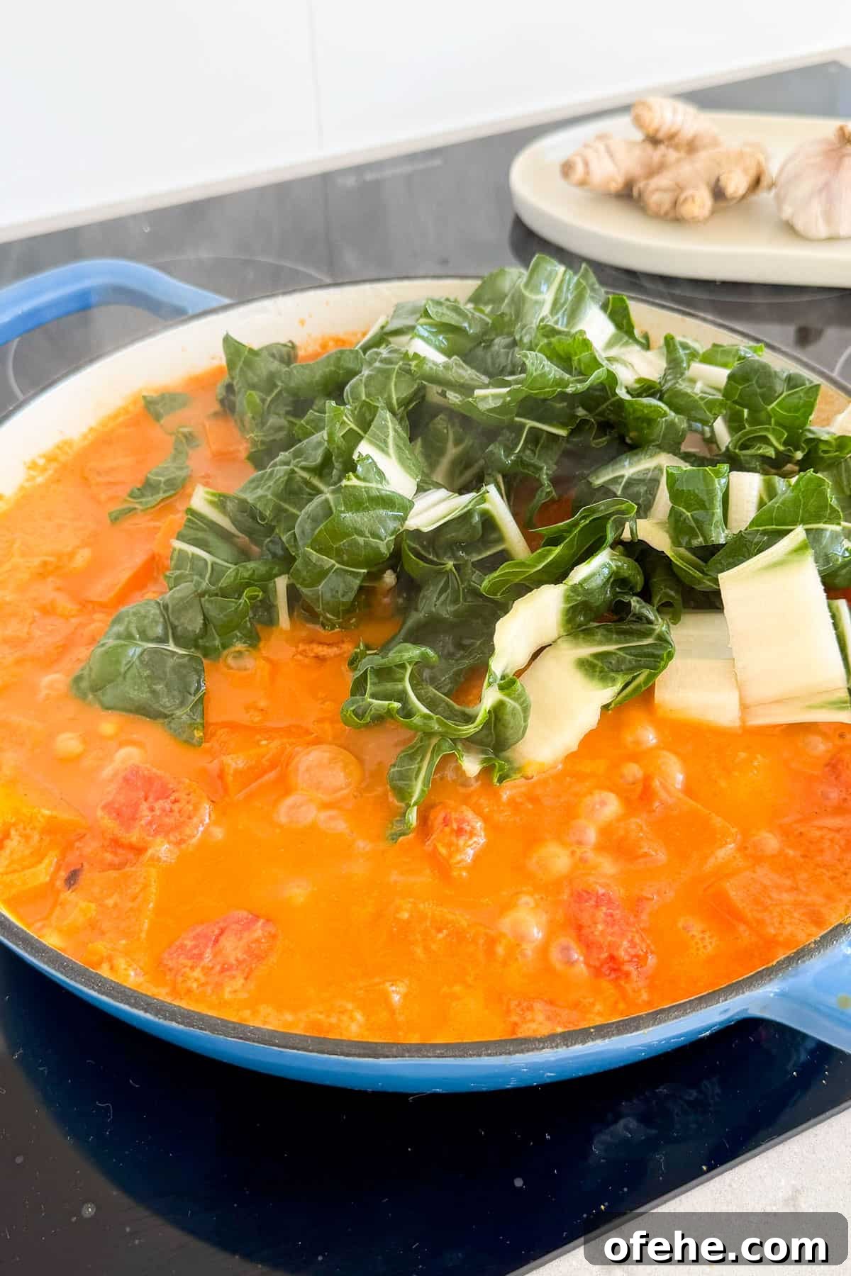 Silverbeet added to the curry.